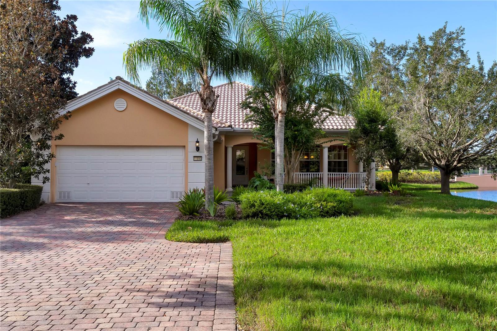 Welcome to a rare opportunity in the highly sought-after VillageWalk at Lake Nona! This stunning Heritage Series Carlyle Model offers 4 spacious bedrooms and 3 full baths, all thoughtfully designed within a single-story layout that blends comfort with elegance. Perfectly positioned on a premium homesite, this residence boasts serene water views from two sides, creating a picturesque backdrop for everyday living. VillageWalk is a prestigious guard-gated community where luxury meets convenience, offering a maintenance-free lifestyle with world-class amenities. Residents enjoy a heated lap pool, a resort-style pool, a state-of-the-art fitness center, tennis pavilion with 6 lighted courts, basketball court, tot lot, lakeside gazebo, game room, multipurpose event space, café and deli market, gas station, and even an on-site post office. Designed for both relaxation and recreation, VillageWalk makes it easy to live, work, and play without ever leaving home. Ideally located in the heart of Lake Nona, this master-planned 500-acre community is just one mile from the renowned Medical City, placing top-tier healthcare, education, shopping, dining, and entertainment right at your fingertips. Don’t miss your chance to own this exceptional home—schedule your private showing today!