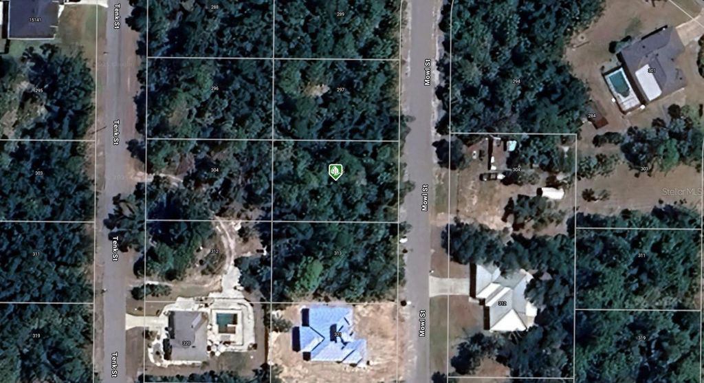 Photo of 305 Mowl Street, Port Charlotte, FL 33953 (MLS # A4666396)