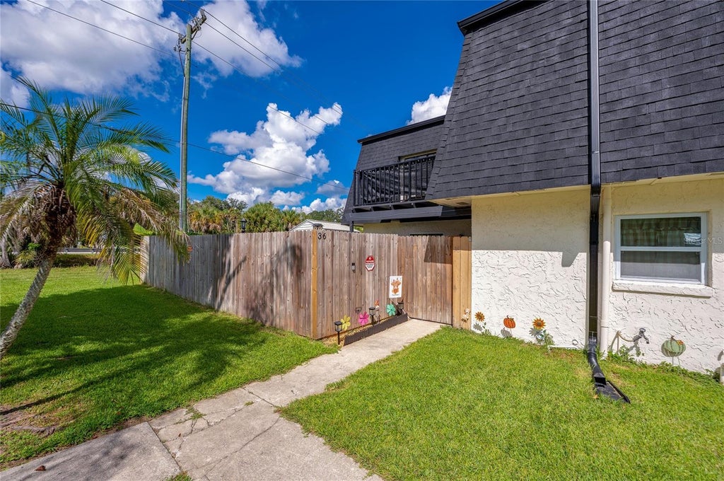Photo of 36 Springwood Square, Port Orange, FL 32129 (MLS # V4951308)