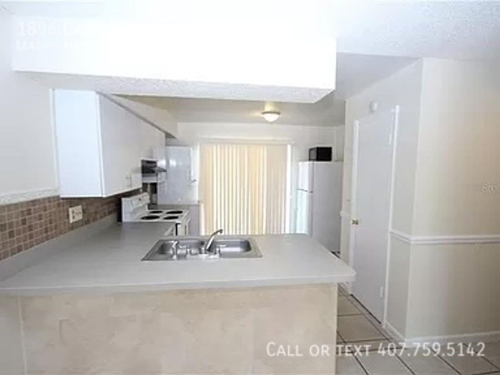 Photo of 1896 Caralee Boulevard #2, Orlando, FL 32822 (MLS # O6382712)