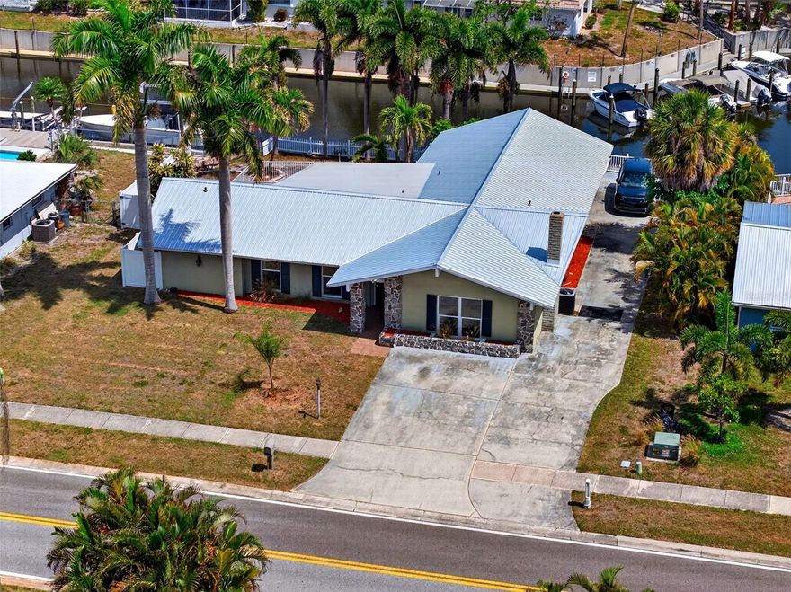 Location, Location, Location! 

Exceptional waterfront opportunity offering direct access to the Gulf and endless potential. This rare Sarasota property features 3 bedrooms, 2 bathrooms, and a spacious great room ideal for entertaining or easily converted into a 4th bedroom or flex space.

Enjoy outdoor living with a large yard, private pool, and ample space for gatherings, relaxation, or future enhancements. Major updates include a new metal roof (2025) and AC system (2021), providing peace of mind for years to come.

Perfectly situated just over 2 miles from Siesta Key’s world-renowned beaches, with shopping, dining, and entertainment just minutes away. Whether you're looking to renovate, invest, or create your dream waterfront retreat, this property offers unmatched value and location.