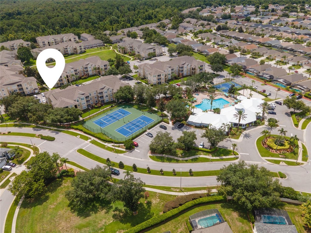 Photo of 2301 Butterfly Palm Way #203, Kissimmee, FL 34747 (MLS # O6443514)