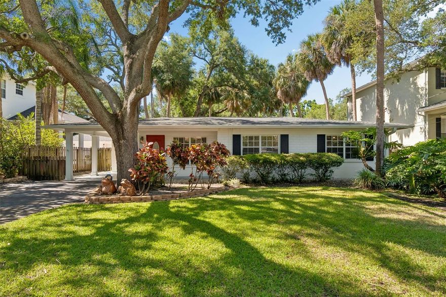 Thoughtfully updated one-story concrete block home in South Tampa, offering a clean, open feel and effortless flow. A spacious gallery-style entry—ideal for artwork—leads into a light-filled living and dining area. The home features 3 bedrooms and 2 baths split plan, with luxury vinyl plank flooring in the bedrooms and travertine throughout the main living areas. The kitchen is well-appointed with granite countertops, solid wood cabinetry, and all-new appliances. The oversized primary suite offers flexibility for a sitting area, workspace, or additional storage. French doors open to a generous 34' x 14' screened lanai, creating an inviting extension of the living space. A detached concrete block workshop, 1-car carport, and fully landscaped yard with well irrigation add both function and appeal. Renovated in 2024/2025 with a new roof, HVAC, and appliances, the home offers peace of mind. While it experienced storm-related damage, it has been fully remediated. Ideally located in South Tampa, very close to top-rated schools and surrounded by a wave of new construction, this is a move-in-ready opportunity in one of the area’s most desirable neighborhoods. Call to schedule your private showing.
