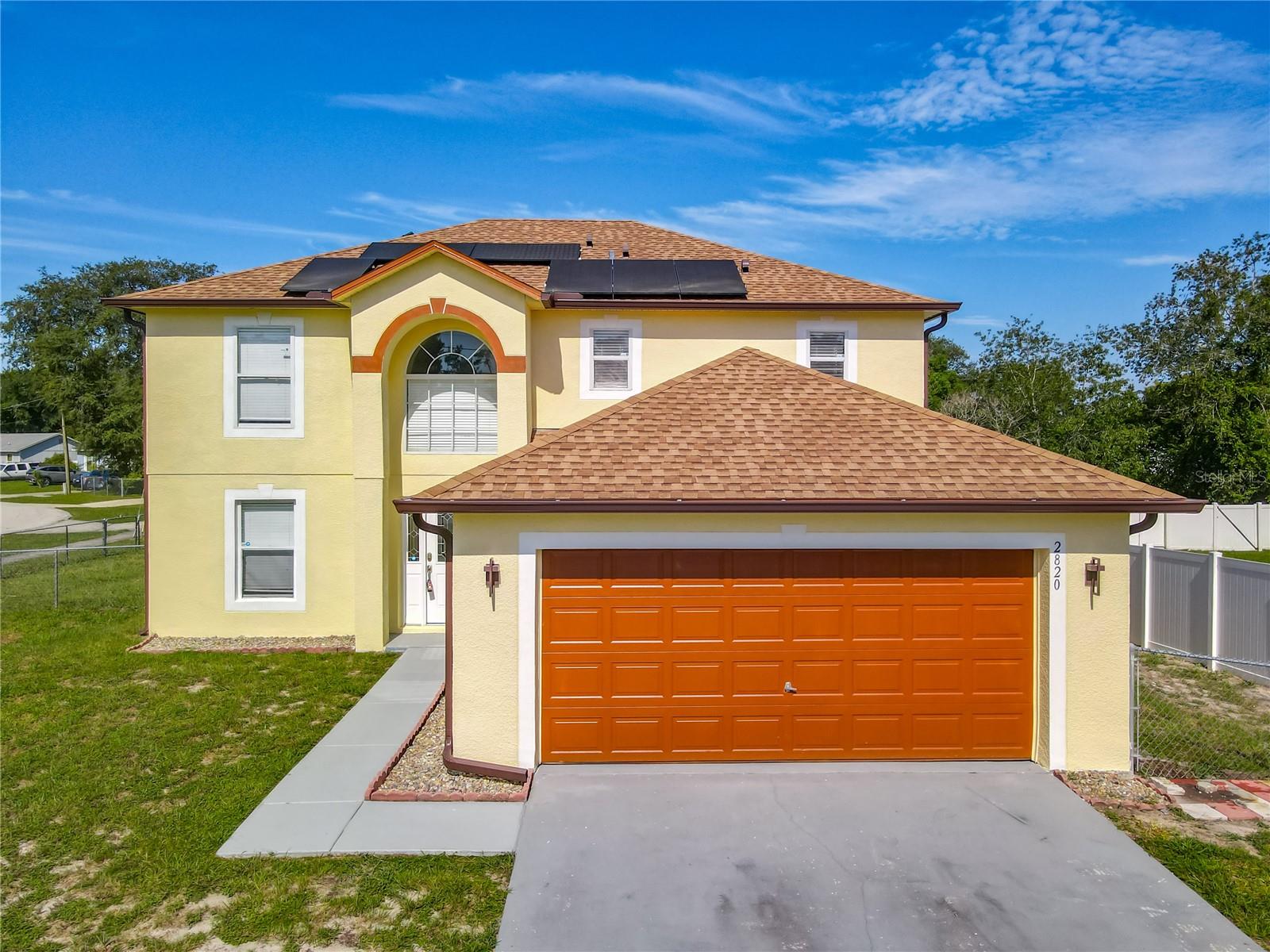 Move-In Ready 4-Bedroom Home with Solar Panels and No HOA!
This updated 2,222 sq ft home offers 4 bedrooms, 2.5 baths, and a 2-car garage on an oversized corner lot with a fully fenced backyard, two gated sections, and a 12-ft wide gate for RV or boat access. Enjoy a spacious open patio and plenty of parking. Interior features include tile flooring throughout the main level, new gray wood stairs and upstairs hallway, and fresh paint inside and out. The spacious kitchen includes two pantries, a 4-ft island, and opens to a 19x13 family room, plus an extra living area that can function as a 5th bedroom or office on the first floor. The primary suite features dual walk-in closets, a garden tub, separate shower, and private toilet room. Also includes a laundry room, stairwell storage, and a half bath on the main floor. No HOA and fully paid-off solar panels — enjoy an electricity bill of only $37/month. All documentation for the solar system and electric bills is available. Located near I-4, SR 415, and Howland Blvd, with easy access to Sanford, Lake Mary, Daytona, and Downtown Orlando. Close to major employers including AdventHealth, Amazon, and Sanford Airport.
First-time homebuyer assistance available for W2 and 1099 income — ask about qualification!
Vacant and easy to show.