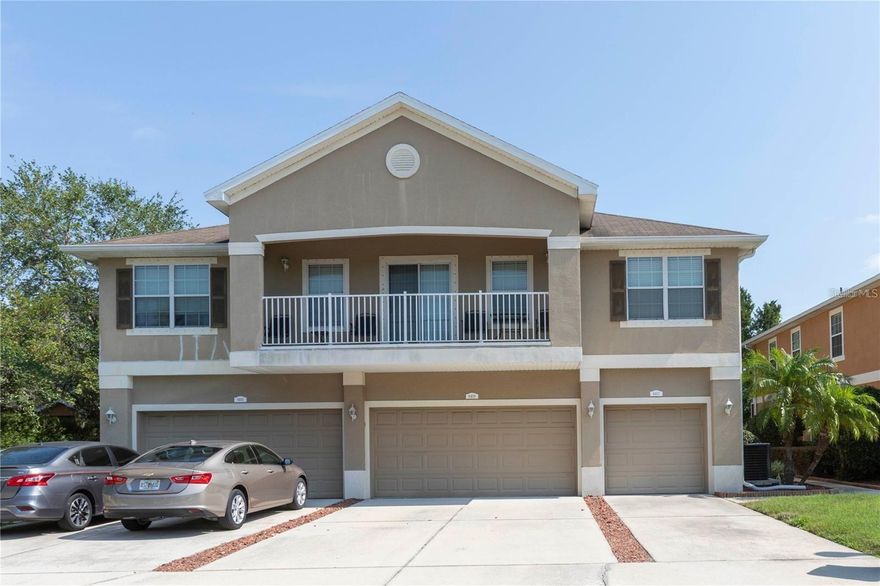 One or more photo(s) has been virtually staged. MOTIVATED SELLER—BRING ALL OFFERS! Extended home warranty through July 2027!

Beautifully maintained 3-bedroom, 2.5-bath townhome with a 2-car garage—truly move-in ready. The upgraded kitchen features 42" maple cabinets, stainless steel appliances, and a breakfast bar, all opening to a spacious, light-filled layout. The family room, dining area, kitchen, and foyer showcase tile flooring throughout, creating a clean, cohesive look.

Sliding glass doors off the dining area lead to a screened-in patio, plus an additional slab perfect for grilling and outdoor entertaining. The main level also offers a convenient half bath and indoor laundry room. Fresh interior paint, including the garage, completed August 2025.

Upstairs, the expansive primary suite features vaulted ceilings, a dual-sink vanity, and a walk-in shower. Two additional generously sized bedrooms and a full bath complete the upper level.

Major updates include a NEW ROOF (October 2025) and HVAC approximately 5 years old.

Ideally located in New Port Richey, just minutes from shopping, dining, banking, medical facilities, and the county complex, with easy access to the Suncoast Parkway and Tampa International Airport.

Low HOA, NO flood zone.
This one is priced right!