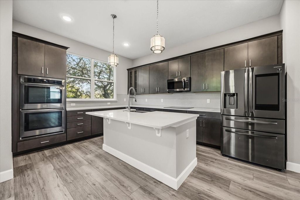 Photo of 3505 Tracy Vickers Alley, Orlando, FL 32828 (MLS # O6391569)