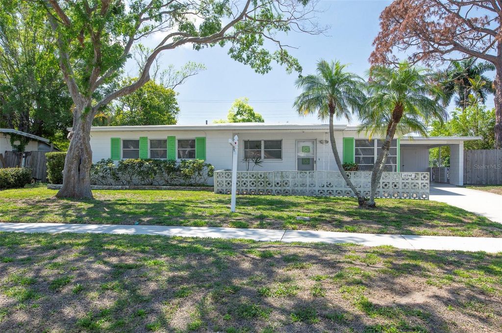 Photo of 15348 Bedford Circle W, Clearwater, FL 33764 (MLS # TB8492507)