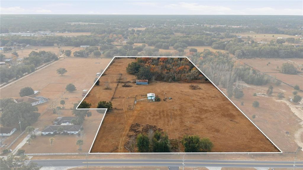 Photo of 9900 SE Sunset Harbor Road, Summerfield, FL 34491 (MLS # OM717282)