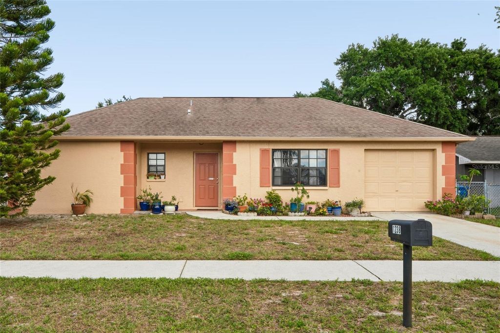 Photo of 1238 Fuchsia Drive, Holiday, FL 34691 (MLS # TB8511664)