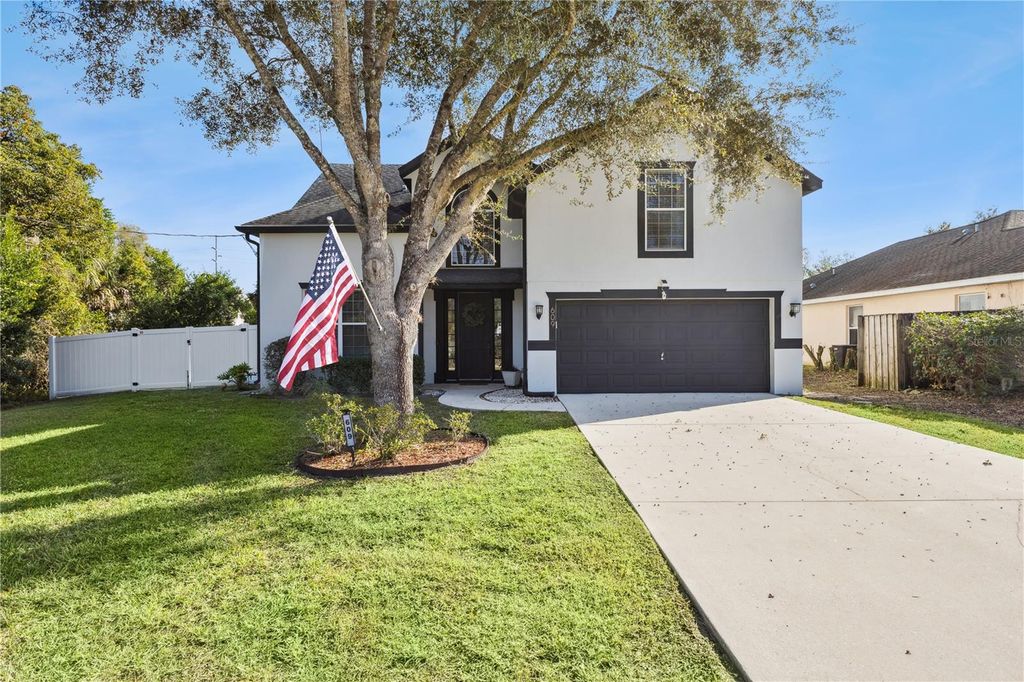 Photo of 609 Rhodes Drive, Deland, FL 32720 (MLS # O6366321)