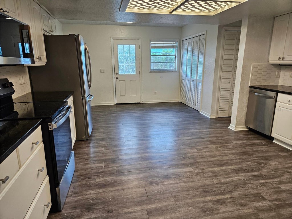 Photo of 2731 Moss Grove Boulevard, Orlando, FL 32807 (MLS # TB8553547)