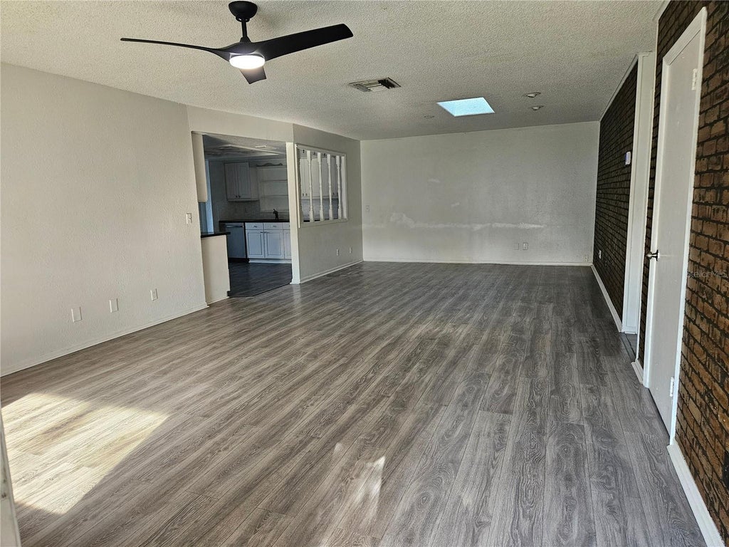 Photo of 2731 Moss Grove Boulevard, Orlando, FL 32807 (MLS # TB8553547)