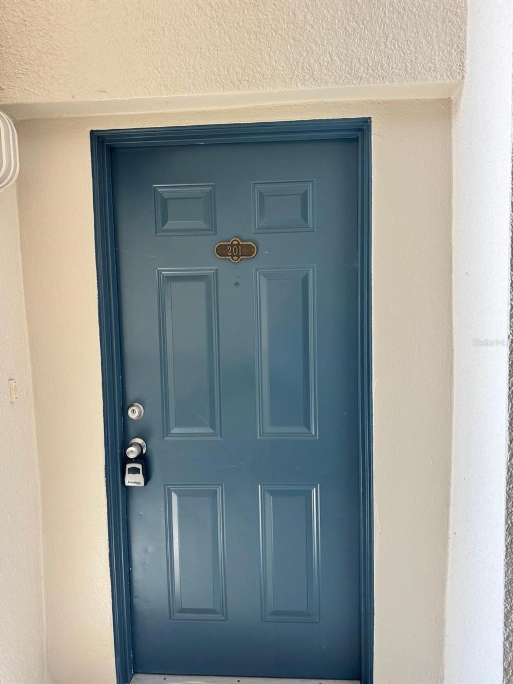 Photo of 3001 Greystone Loop #201, Kissimmee, FL 34741 (MLS # O6373186)