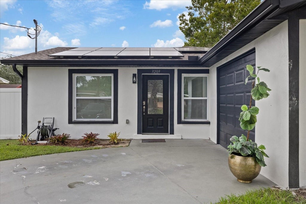 Photo of 3209 E Hanna Avenue, Tampa, FL 33610 (MLS # TB8535966)