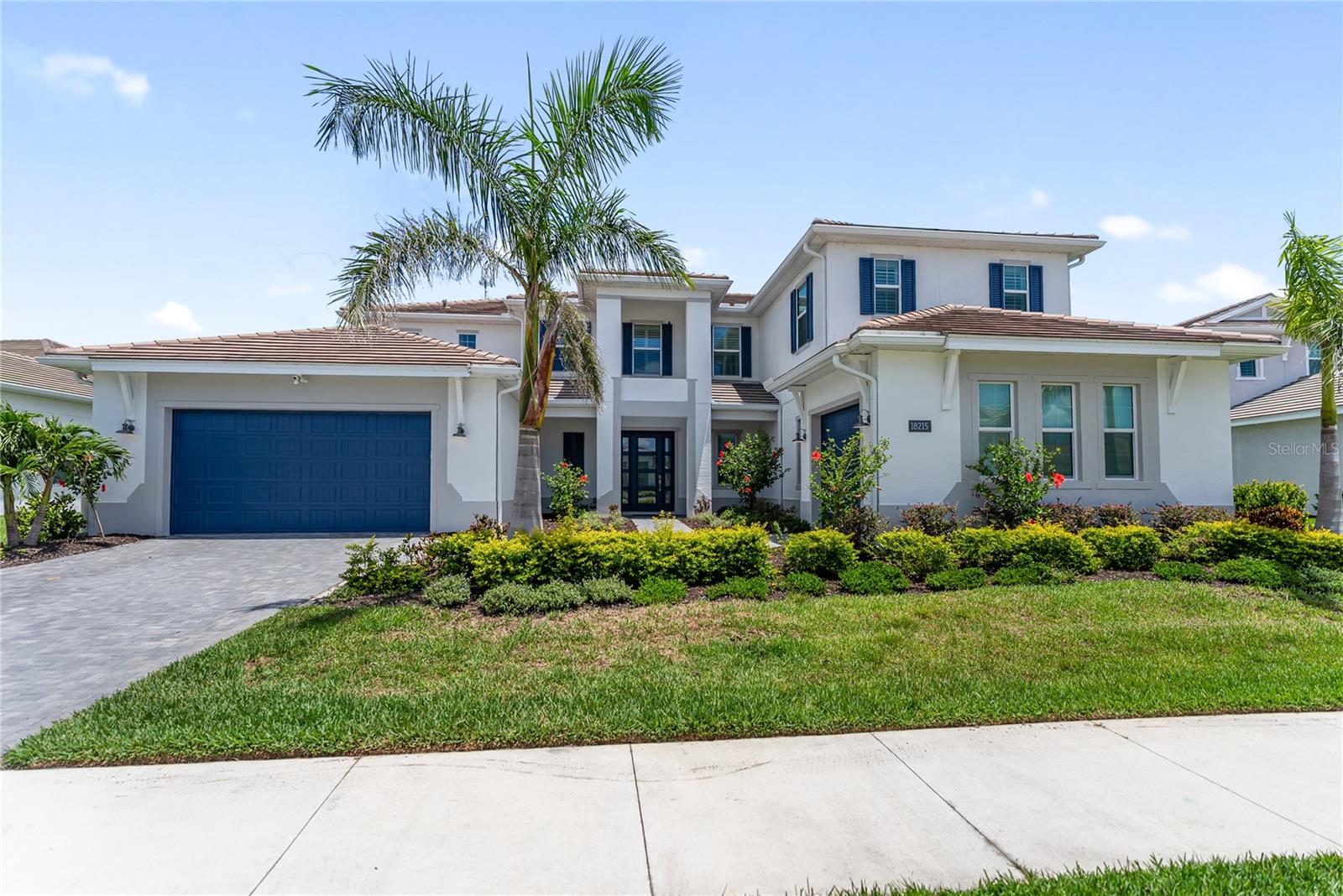 Step into this beautifully designed 6-bedroom home that offers the perfect blend of spacious living and relaxed Florida charm. From the moment you enter the welcoming foyer, you're drawn into the expansive great room, where soaring ceilings stretch to the second floor, filling the space with natural light and an open, airy feel. The kitchen is a chef’s dream, featuring sleek countertops, ample cabinetry for storage, and a gas stove—perfect for preparing family meals or entertaining guests. A casual dining area sits just off the kitchen, ideal for everyday gatherings. Each of the six bedrooms is generously sized with plenty of closet space, providing flexibility for guests, home offices, or growing families. Outside, your private fenced-in pool area awaits, complete with a sparkling pool and spa, offering the ultimate space to unwind and enjoy the Florida lifestyle. Located in the Isles at Lakewood Ranch, this home also offers access to resort-style amenities including a luxurious clubhouse, state-of-the-art fitness center, tropical pool with cabanas, tennis and pickleball courts, scenic walking trails, and beautiful lake views. It’s a vibrant, gated community designed for both relaxation and recreation. Don’t miss your chance to own this exceptional property in one of Lakewood Ranch’s most desirable neighborhoods—schedule your private showing today!