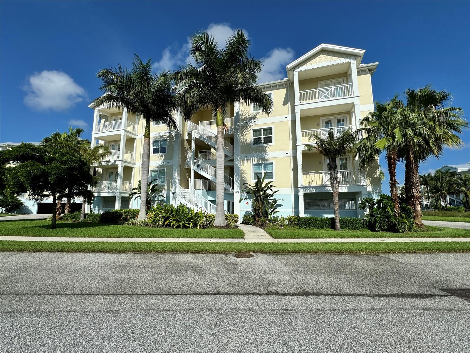Luxury Condo at Palma Sola Bay Club. Located on the second floor, this 3 bedroom / 2.5 bath residence offers an open floor plan with 10’ foot ceilings with expansive window views and ample natural sunlight. Other features include upgraded granite countertops, hardwood cabinetry and two private outdoor balconies with one overlooking the bay with stunning sunsets and the other overlooking a nature preserve from the master bedroom, Palma Sola Bay Club is located just minutes away from the pristine beaches of the Gulf of Mexico. Conveniently located close to a variety of fine dining, entertainment and golf courses. The community is a gated 30 acre preserve featuring an observation deck overlooking Palma Sola Bay. The two-story clubhouse features fitness center, billiards table, social room and two kitchens for entertaining. Outside you can enjoy a heated pool with an expanded deck for lounging, fire pit, and outdoor entertainment space complete with a wet bar, gas grill, bocce ball court, putting green, and kayak launch. Come enjoy the Good Life at The Palma Sola Bay Club.