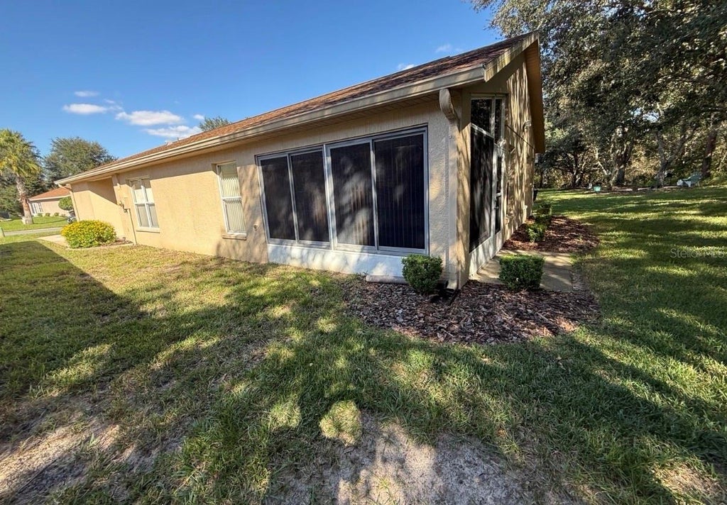 Photo of 11210 Heathrow Avenue, Spring Hill, FL 34609 (MLS # TB8561829)