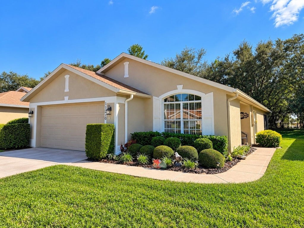 Photo of 11210 Heathrow Avenue, Spring Hill, FL 34609 (MLS # TB8561829)