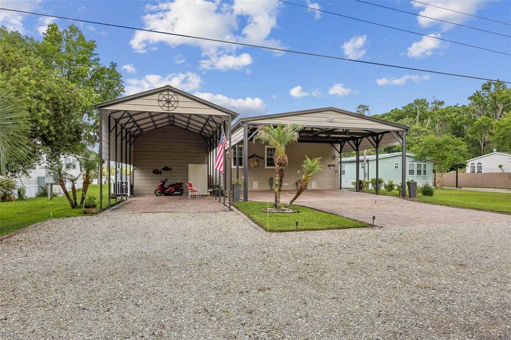 Photo of 329 Paradise Circle, Satsuma, FL 32189 (MLS # GC540449)