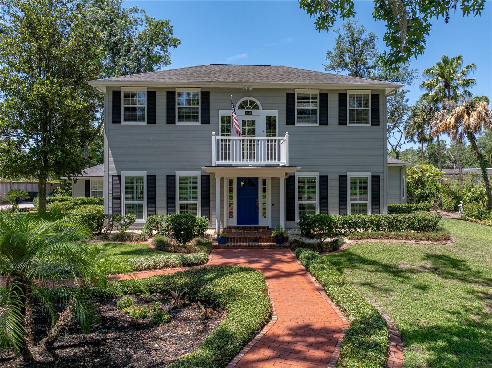 Immaculate Southern Style 4BR/4BA pool home, nestled in the heart of Brandon, far enough away from the hustle and bustle, but close enough for all your needs. Thoughtfully landscaped and manicured lawn greets you as this is not your cookie cutter neighborhood or home!
Entering into the inviting foyer, you will find hardwood flooring that flows throughout the home. The formal living room is not only spacious but offers a refined setting for hosting get togethers. As you make your way into the formal dining room you will start to envision creating lasting memories as this is the ideal setting for entertaining guests. The kitchen boasts granite stone countertops, freshly painted cabinetry, updated marble tiles backsplash and new hardware, a double convection oven plus a water filtration system at the sink. This kitchen is ideal for everyday cooking or entertaining positioned between the formal dining room and family room. There is also an area off the kitchen currently being utilized as a dinette that includes a bay window with seat; this space would make a nice sitting area as well. The home is bright and inviting with loads of natural light provided by three sets of french doors and loads of windows. This beautifully designed family room offers a blend of functionality and style with its cozy fireplace, crown molding and wood floors. Perfect for family game nights, movie nights or even your casual gatherings. As you make your way around you will find tucked away your very own private office nicely separated from the main living area. Conveniently located downstairs is a generous size bedroom that would be optimal for visiting guests or multigenerational accommodations. It has a separate full bath that has newly replaced double sink vanity and hot water heater. The second full bath located off the living room by an exterior door makes this the perfect choice for a pool bathroom. Upstairs, you find the wood flooring continues and the landing provides another french doors that walks out to a balcony. Great to decorate for the holidays! There are two secondary, large sized bedrooms, as well as the primary bedroom. The third full bath is located in upstairs hallway and new vanity and lighting too. The primary bedroom features French doors leading to a balcony that spans the back of home and overlooks the pool, as well as built-in features that frame a wood-burning fireplace. The primary also boasts a bright and airy en suite which includes a dual sink vanity, glass and marble tile walk-in shower with multiple shower heads and a bench, a clawfoot tub, and a walk-in closet with custom built-in cabinets. A special feature is a detached poolside bonus room that can be utilized as you like. Think of creating a media room, game room, poolside fun, whatever your heart desires. There is even an area that includes a mini-fridge and mini-sink; just add of microwave and you have a kitchenette! Now let’s escape to your very own private oasis out back!! Close your eyes and imagine entertaining, swimming, grilling and lounging. This pool deck is huge compared to most others. Enjoy your year-round escape filled with relaxation in your very own backyard. When you wake up take your morning stroll out front where you have a lovely view of the pond across the street. This neighborhood is great for walks and has been called “Brandon’s best kept secret”! Schedule to see this home today and make it yours! Your Florida memories are waiting to be made.