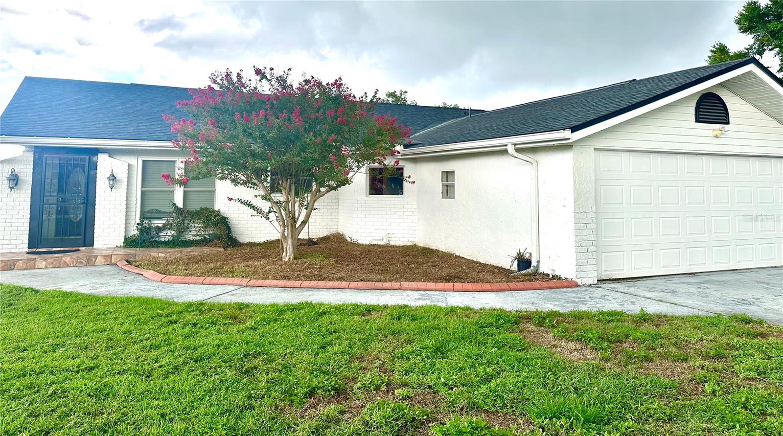 Fantastic Maitland lakefront location! This home sits on a large lot overlooking Lake Gem. As you enter the home, you are greeting by expansive lake views and gorgeous wood floors. There is a separate dining room, as well as an eat-in area off the spacious kitchen with updated appliances. Off the living room, you can descend to the walkout basement that can be used as a game room, tv room, or exercise area. The three bedrooms are located on the main level, and include a primary with large closet and en suite bathroom. The screened in patio off the living room offers gorgeous lake views and room for outdoor dining. There is a separate laundry room in the two-car garage, a large driveway for plenty of additional parking and a basketball hoop for outdoor fun. Come check out this great home today.