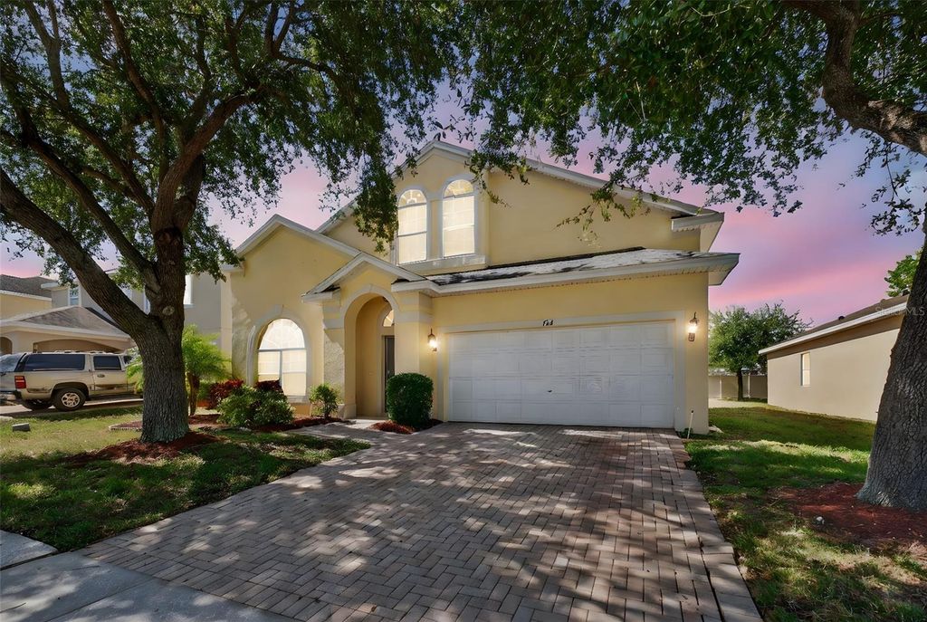 Photo of 724 Andalusia Loop, Davenport, FL 33837 (MLS # S5136970)