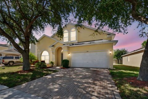 Photo of 724 Andalusia Loop, Davenport, FL 33837 (MLS # S5136970)