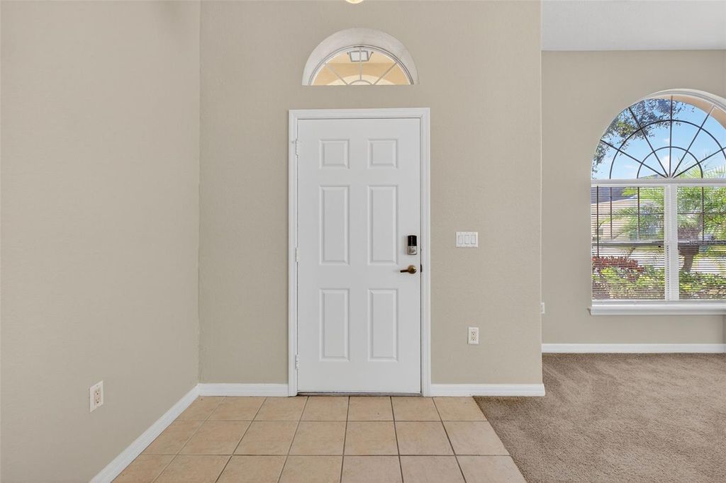 Photo of 724 Andalusia Loop, Davenport, FL 33837 (MLS # S5136970)