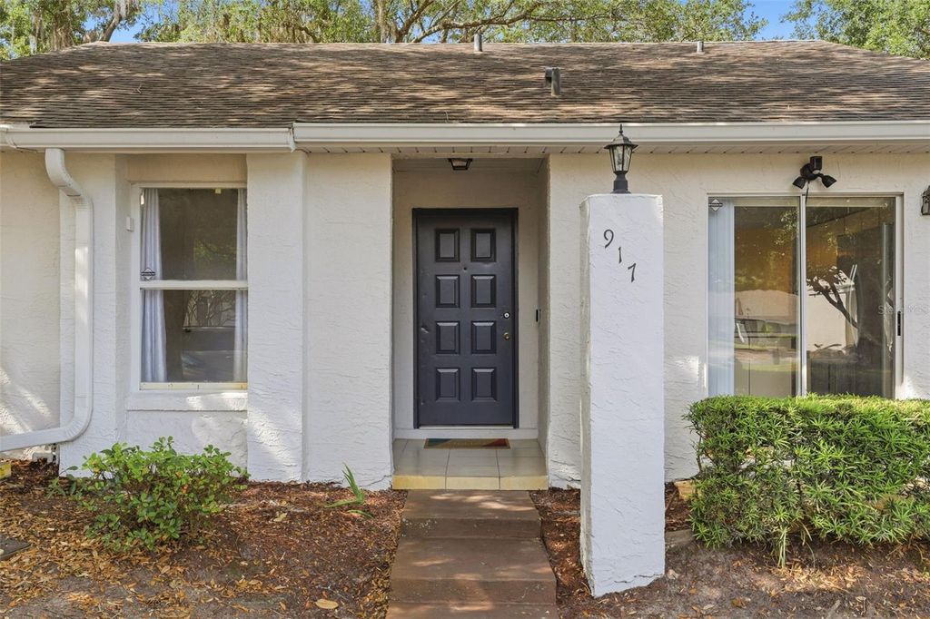 Photo of 917 Pebble Creek Circle, Orlando, FL 32824 (MLS # O6404048)