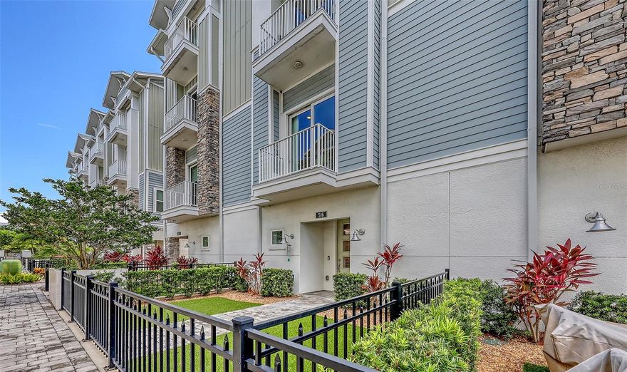 It really is all about the location. The best value in Sarasota's iconic Laurel Park historic district for a single-family residence, bar none. Fee simple ownership, NOT a condominium. Fully adorned in tasteful taupe and grey urban chic, this beautiful multi-level urban townhome absolutely has everything; high end engineered hardwood flooring in the living areas, three spacious bedrooms all with en suite designer baths and walk-in closets, a den/office, an elevator servicing all floors, an upstairs dry bar with beverage cooler, three large interior storage closets, and a two car garage. The large well-designed chef's kitchen includes quartz countertops, solid wood cabinets, induction cook top, stainless steel appliances and a large center island featuring a breakfast bar. At over 2400 square feet of living space, the large open concept living area is sure to impress. Impact rated windows and sliding glass doors offer energy efficiency, sound dampening, safety and peace of mind. This well maintained, gently lived-in six years new townhome is perfectly situated in one of Sarasota's most sought-after neighborhoods and is convenient to all Sarasota has to offer; downtown shopping and restaurants, Lido Beach, Siesta Beach, Bayfront Park, Laurel Park, Southside Village, and nearby Payne Park. Maintenance free living in the heart of downtown. A lot to like!