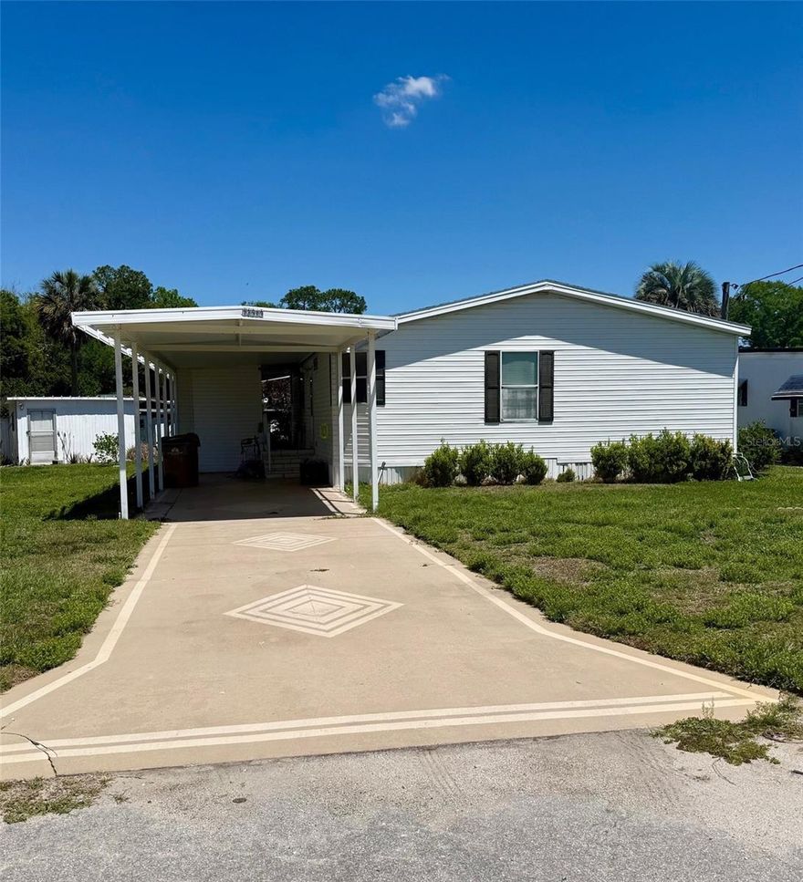BRING YOUR BOAT!! Canal Front Home with direct access to Little Lake Harris and the Lake Harris Chain of Lakes.
 Enjoy waterfront living in this well maintained 2bedroom / 2 bath 1995 Manufactured home with private boat dock and boat house.
 No HOA and no neighbors across the street allowing for privacy. 
The oversized 2025 newly remodeled screen enclosure in great for entertaining or just relaxing an enjoy the water view. 
Just a short drive to Downtown Mount Dora,Tavares and Leesburg.
New roof in 2025.
