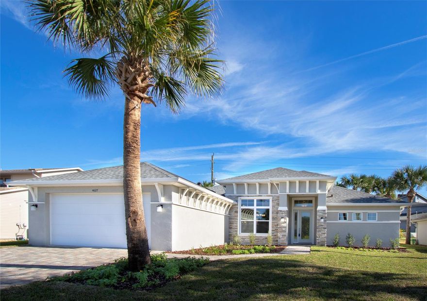 Looking for a brand-new home on beachside! Located on the seaward side of S. Atlantic Ave, this property enjoys easy access to non-driving beach in Silver Sands area of NSB. Open concept, split floor plan; 12’ ceilings in the main living area; tray ceilings in great room and master suite; Gorgeous center island kitchen with shaker style cabinets, quartz counters, natural gas range/oven, stainless steel GE kitchen appliances including refrigerator. Sun tunnels located throughout the home bring in extra light and a tankless gas hot water heater adds to energy efficiency. The home features a spacious master suite with an oversized walk-in closet, attractively appointed master bath with his/her vanity, walk in shower and deep soaking tub. Two private guest suites are located on the opposite side of home and the highly appointed secondary bath features a large walk-in shower. The large rear lanai is pre-plumbed for a summer kitchen and there is room for a pool. Other features include solid wood cabinetry with soft close doors and drawers; 8’ interior/exterior doors; stacking slider at great room and lanai; 8’ foot tall garage door; paver driveway and walkway; stack stone facia and privacy wall on rear property line. Don’t miss out on the opportunity to own this home, call today for a showing. ;Water: City