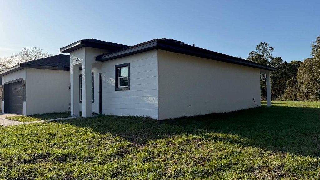 Photo of 1205 Hudson Harbor Lane, Kissimmee, FL 34759 (MLS # O6401055)