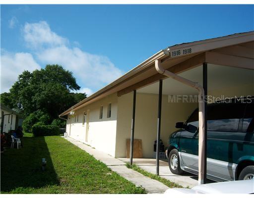 2/2 duplex with Carport, 3 assigned spots, Air tight storage room w/power to use as workshop, fenced yard. New Hurricane impact and thermal windows with power monthly credit. Both bedrooms w/walk in closets and ceiling fans w/lights. Kitchen attached to living room has a bar, sliding glass door to yard w/verticals and ceiling fan w/light. Appliances: Self clean glass range, DW, Self defrost refrige, Microwave, plus optional washer & dryer. This is back unit and no sounds from street w/left carport w/power in it to vacuum your car. Flooring is tile & laminate, neutral earth tone colors. Master bath w/shower, main tub w/shower. Includes water, trash, lawn care. 1st & deposit, pet considered, Vacant & ready. Located across from Palmer Ranch Target & Publix shopping center. Y is 2 min away, I75 12 min, Siesta Key 10min. Hospital 15min. 2nd unit available in August.