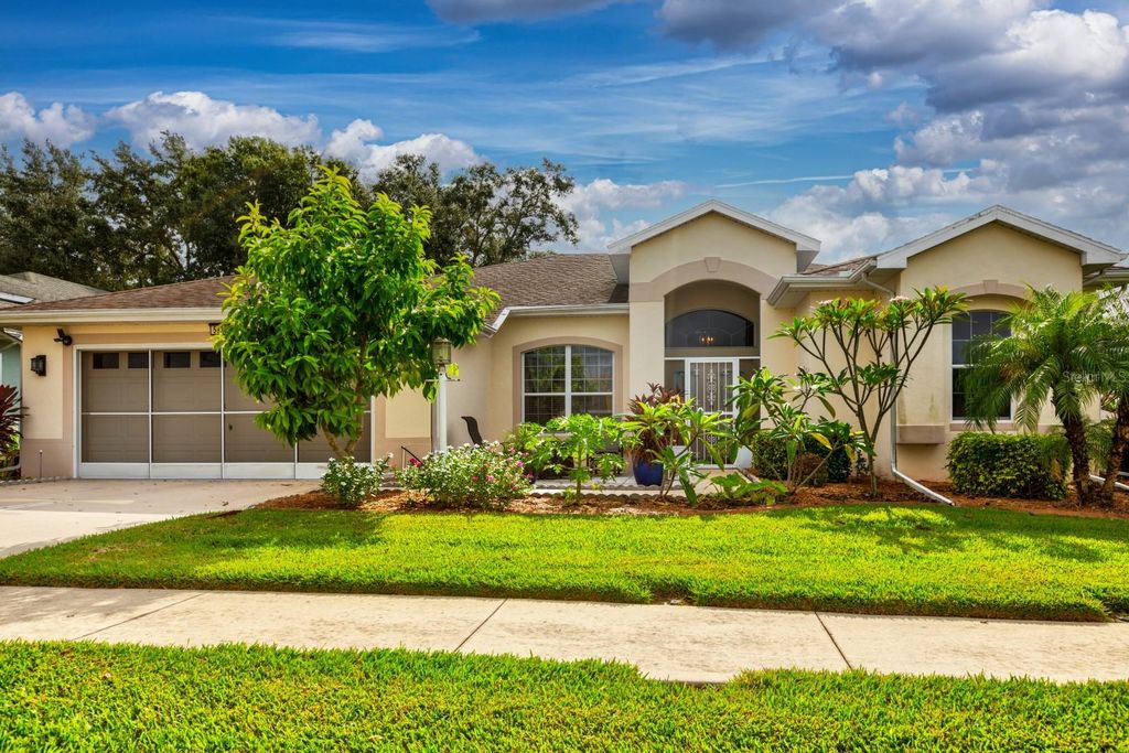 Photo of 5839 Woodland Moss Way, Leesburg, FL 34748 (MLS # G5103158)