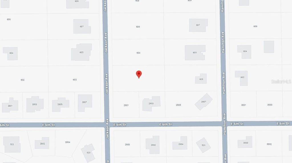 Photo of 602 Jackson Avenue, Lehigh Acres, FL 33972 (MLS # C7526174)