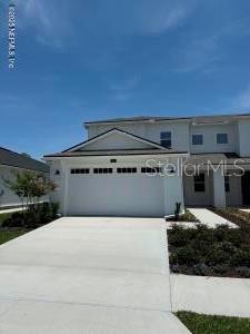 Welcome to the beautifully finished Woodlawn Elite on Homesite 81 at Retreat at Town Center. This quick move-in villa offers stunning pond-to-preserve views and a thoughtfully designed layout perfect for low-maintenance living. The open-concept floor plan features a bright and spacious great room, a designer kitchen with premium KitchenAid appliances, and a luxurious primary suite for your comfort and retreat. Enjoy peaceful mornings or relaxing evenings on the screened-in lanai, all while taking in the natural beauty of your backyard. With landscaping included and a true ''lock and go'' lifestyle, this home is ideal for those seeking comfort, style, and ease. Nestled in a gated community just minutes from shopping, dining, and the beaches, this home blends natural beauty with modern convenience in every detail. A view like this does not last long so hurry in before its gone!