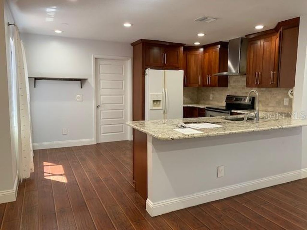 Photo of 987 Beach Breeze Drive, Orlando, FL 32835 (MLS # O6387579)