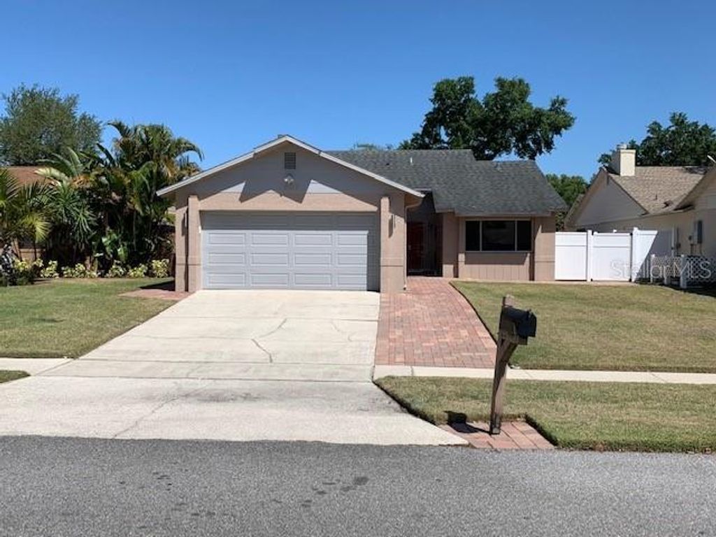 Photo of 987 Beach Breeze Drive, Orlando, FL 32835 (MLS # O6387579)
