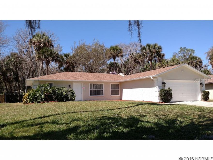 Florida Shores delight. Remodeled home freshly painted inside & outside. Open, split bedroom floor plan. Beautiful new wood laminate flooring in living room & dining area & new tile in kitchen. Huge living room has a corner field stone fireplace with wood mantle and glass sliders out to rear patio. Completely new kitchen with wood cabinets, granite counter tops, stainless steel appliances, accent ceiling lights and a pantry. 5 new ceiling fans. New bedroom carpeting. Both bathrooms remodeled with new tile, fixtures and cabinets. Master suite has a walk in closet, tiled walk in shower & double sink vanity. 2 car garage. Brand new roof. New heat & a/c system. Rain gutters. ;Water: City