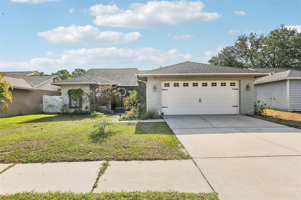 Photo of 11849 Cedarfield Drive, Riverview, FL 33579 (MLS # TB8383070)