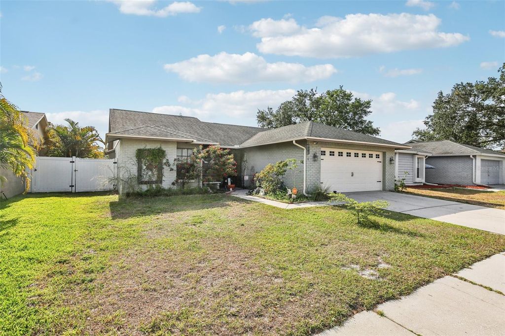 Photo of 11849 Cedarfield Drive, Riverview, FL 33579 (MLS # TB8383070)