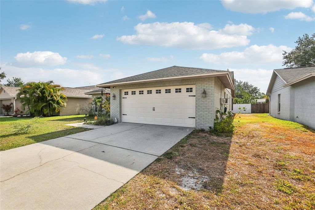 Photo of 11849 Cedarfield Drive, Riverview, FL 33579 (MLS # TB8383070)