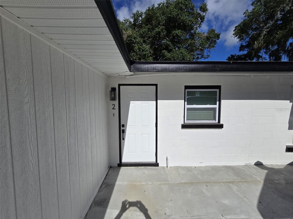 Photo of 416 W Ianthe Street #2, Tavares, FL 32778 (MLS # O6447471)