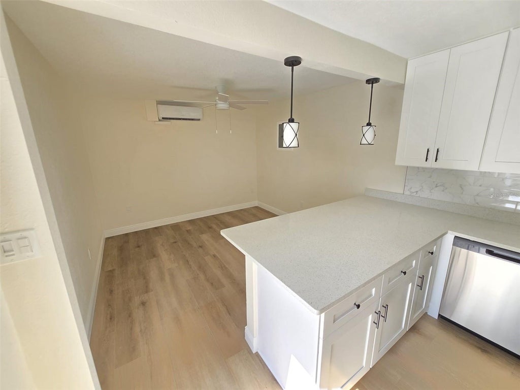 Photo of 416 W Ianthe Street #2, Tavares, FL 32778 (MLS # O6447471)