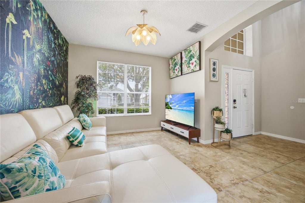 Photo of 2658 Emerald Island Boulevard, Kissimmee, FL 34747 (MLS # O6450840)