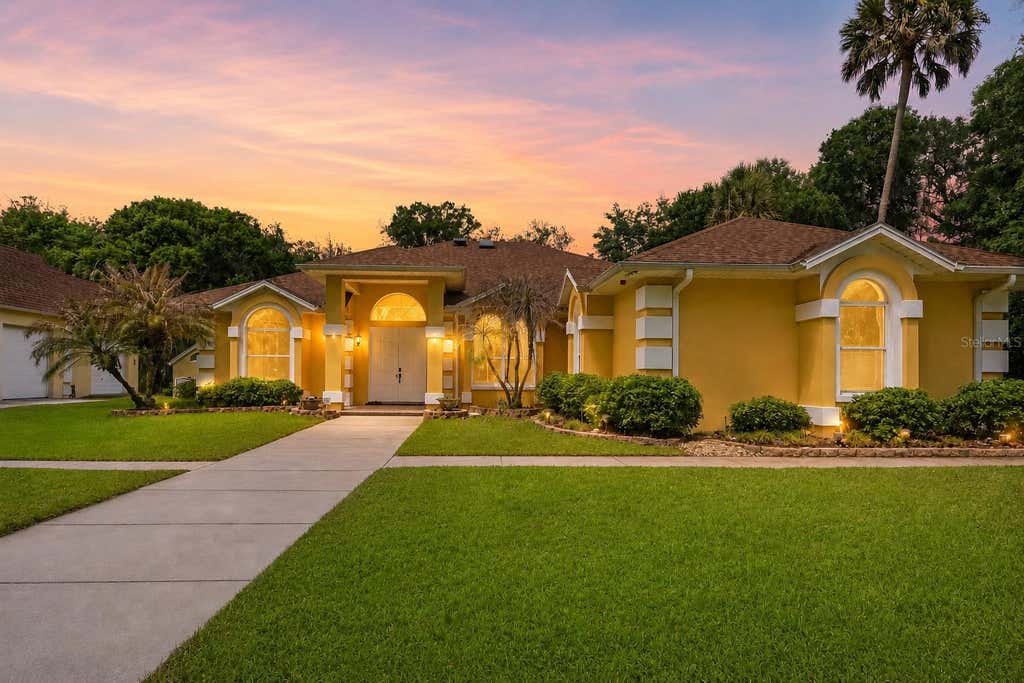 Photo of 1711 Hideaway Forest Trail, New Smyrna Beach, FL 32168 (MLS # NS1088124)