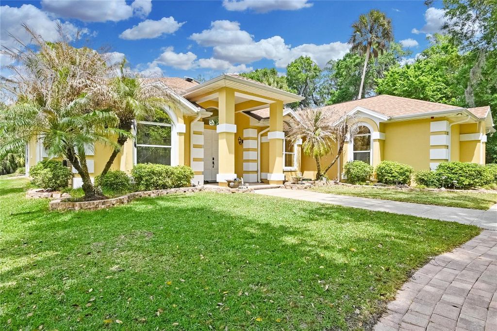 Photo of 1711 Hideaway Forest Trail, New Smyrna Beach, FL 32168 (MLS # NS1088124)