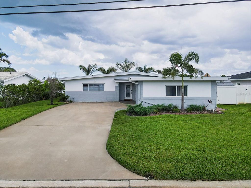 Photo of 730 115th Avenue, Treasure Island, FL 33706 (MLS # TB8417490)
