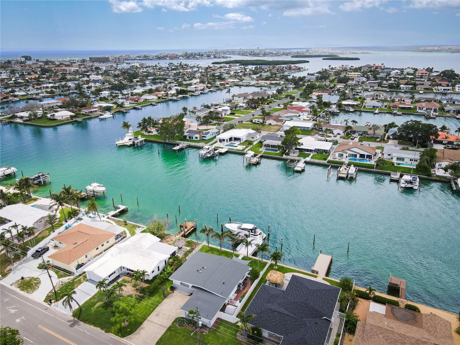 Live the Ultimate Waterfront Dream!
Step right into paradise! This freshly remodeled coastal gem sits on one of Treasure Island’s widest and deepest channels, giving you direct boating access to the Gulf of America in just minutes. New seawall was redone with vinyl in July 2015 and dock were added in 2024—ready for your 60-foot yacht, plus a small boat and jet ski—with dazzling underwater lights that make every evening feel magical.
Inside, soaring vaulted ceilings and open living spaces bring in the sunshine, while sleek modern finishes give the home that perfect “move-in ready” feel. New appliances, plantation shutters in all bedrooms. Spend your mornings cruising to the sandbar or John’s Pass, and your afternoons strolling to the beach. This is more than a home—it’s your gateway to a vibrant, waterfront lifestyle.